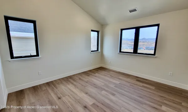 a bathroom with a double vanity sink mirror and