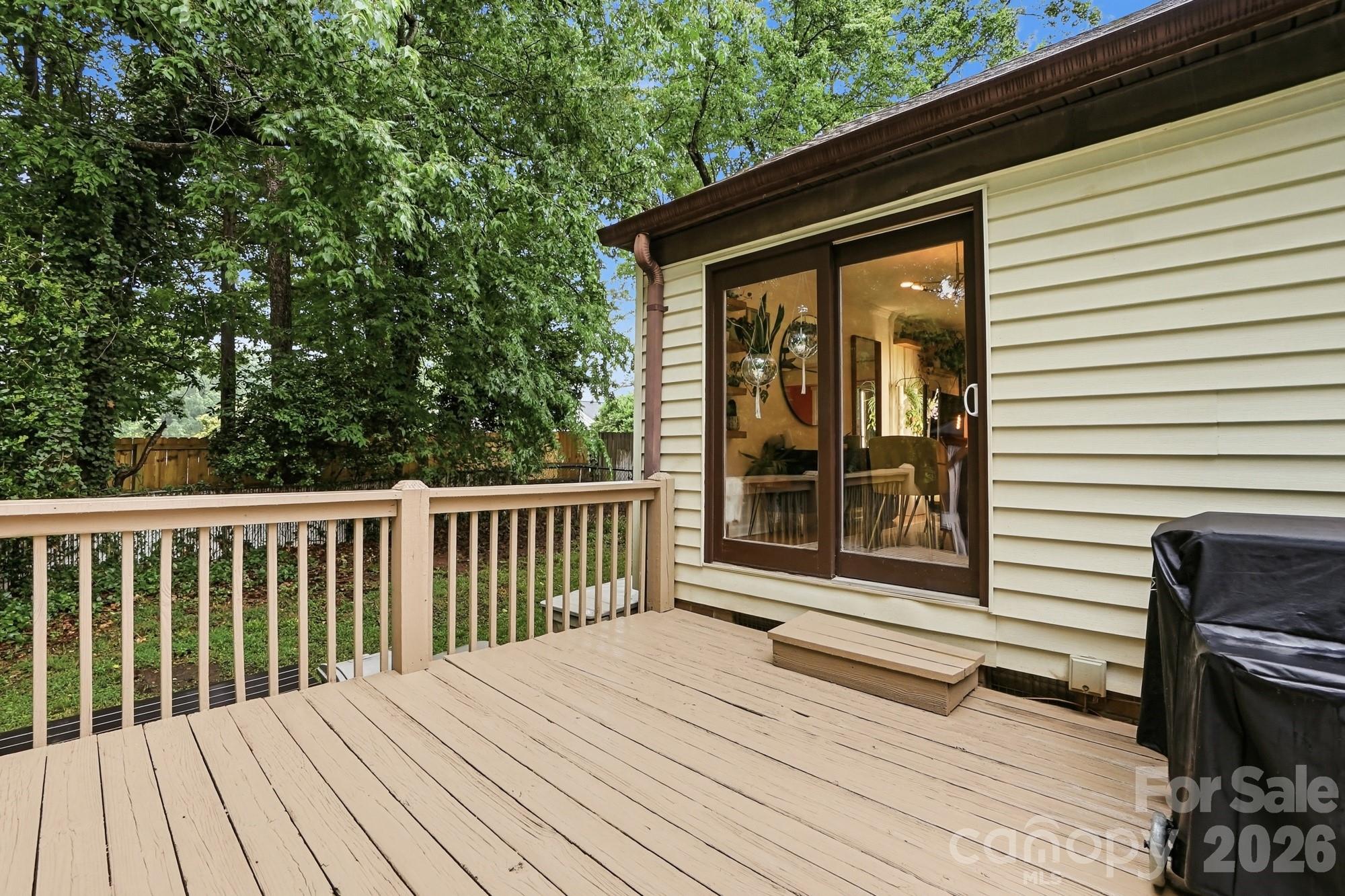 824 Riverwood Road Charlotte, NC 28270 - Photo 26 of 37 a view of backyard with wooden deck
