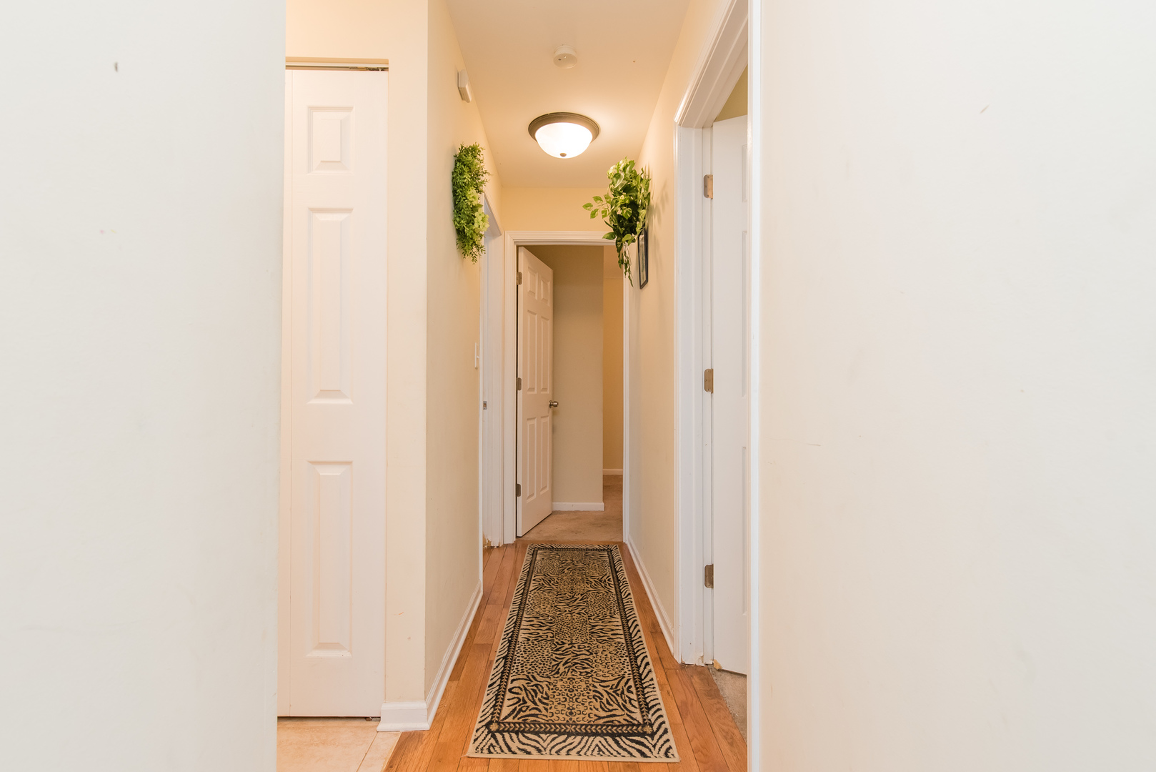 227 Rivers View Drive Carpentersville, IL 60110 - Photo 11 of 24 a view of a room with wooden floor