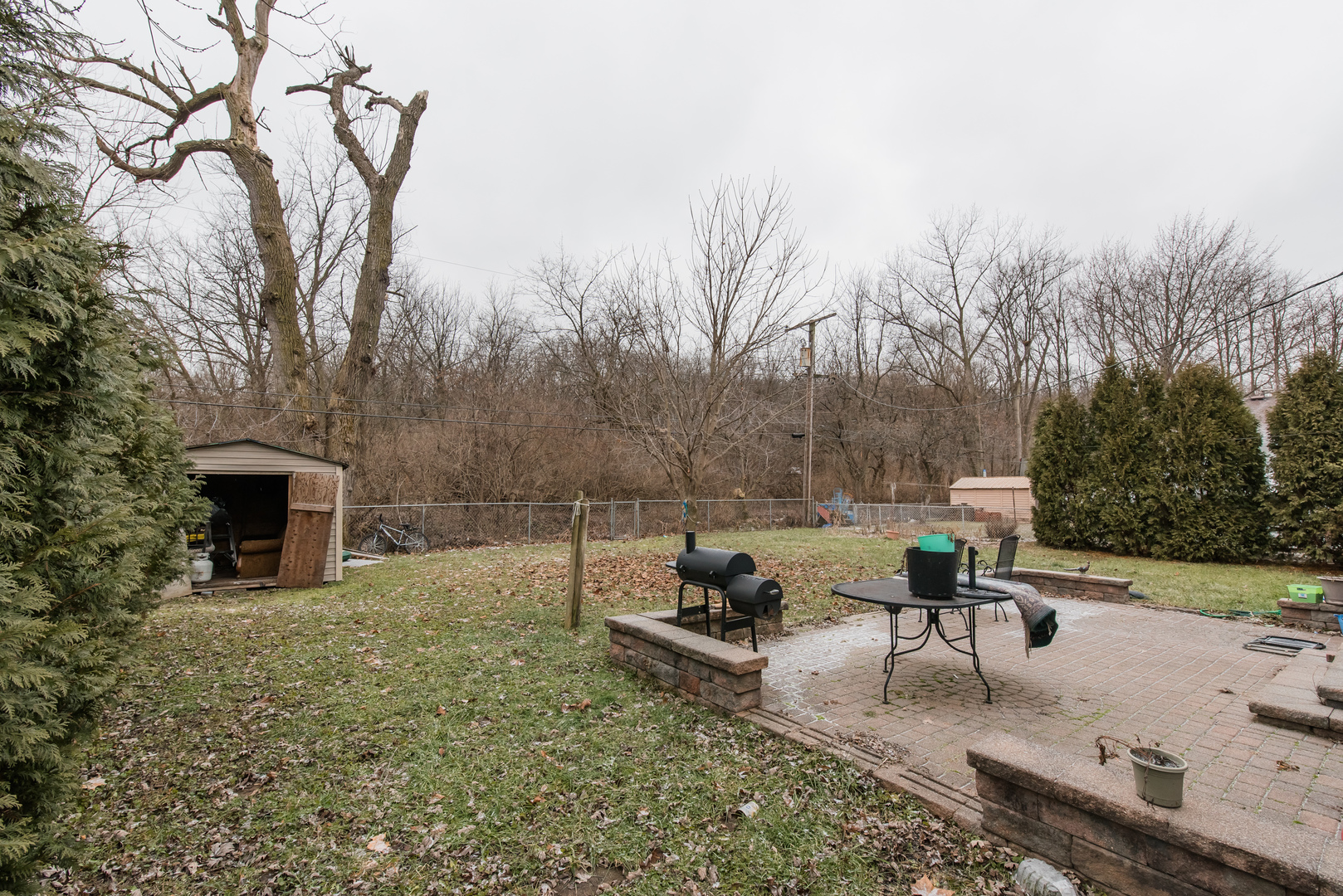 227 Rivers View Drive Carpentersville, IL 60110 - Photo 21 of 24 a view of a backyard with sitting area