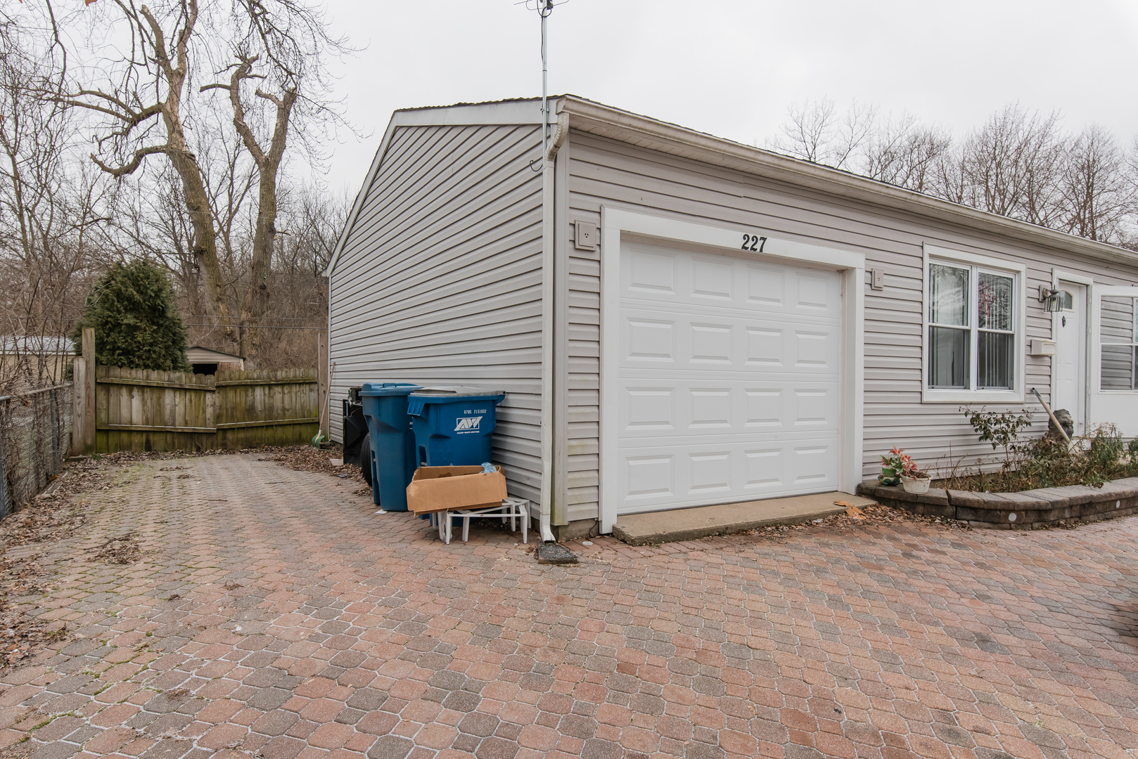 227 Rivers View Drive Carpentersville, IL 60110 - Photo 4 of 24 a view of a house with a yard