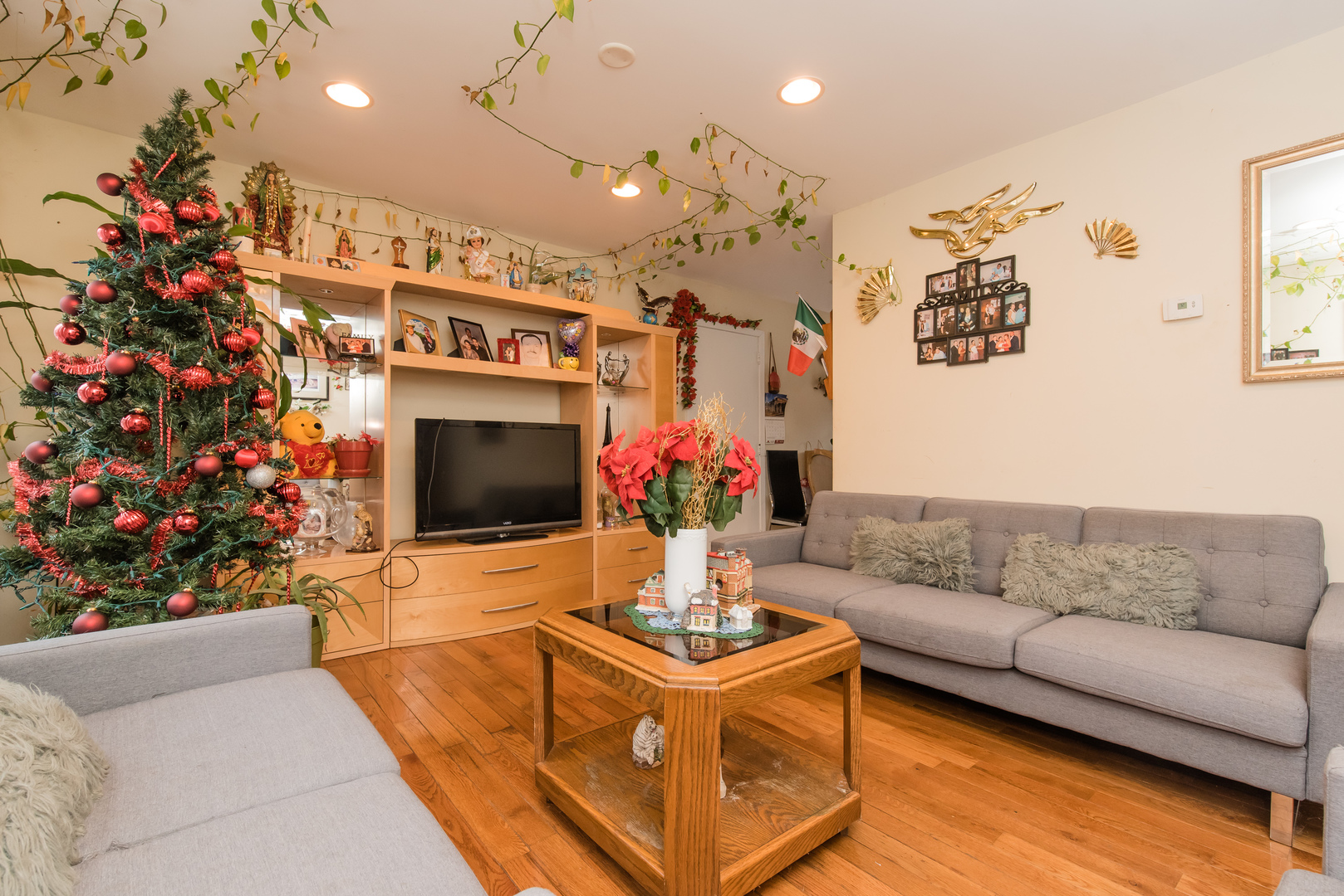 227 Rivers View Drive Carpentersville, IL 60110 - Photo 7 of 24 a living room with furniture a flowers and a fireplace