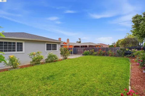 a house view with a garden space