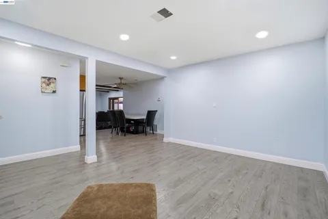 a view of livingroom with furniture and workspace