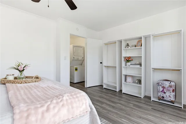 a bedroom with a bed and closet