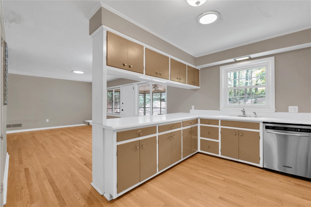106 Mitchell Avenue Clemson, SC 29631 - Photo 12 of 31 This bright kitchen with sleek appliances offers abundant cabinet space and a lovely outdoor view.