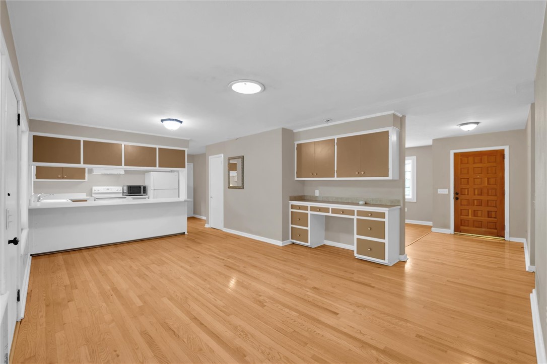 106 Mitchell Avenue Clemson, SC 29631 - Photo 14 of 31 This inviting space features hardwood flooring and a functional kitchen with a practical layout.