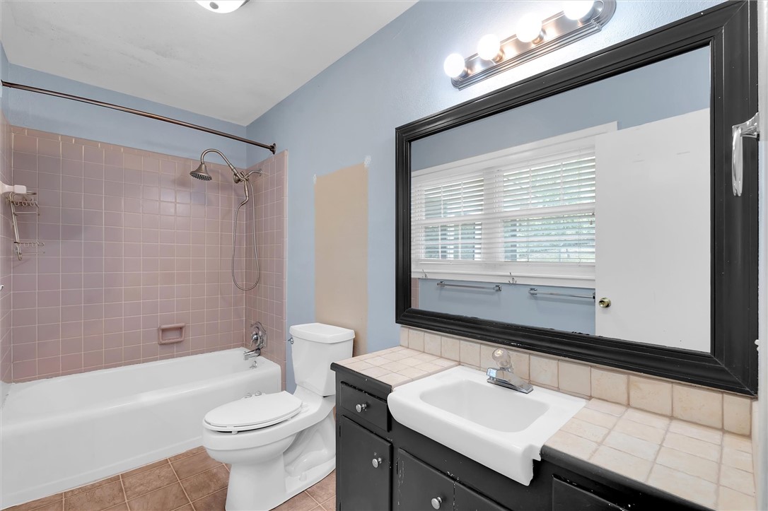 106 Mitchell Avenue Clemson, SC 29631 - Photo 17 of 31 This bathroom features a shower and tub combination, perfect for daily routines.