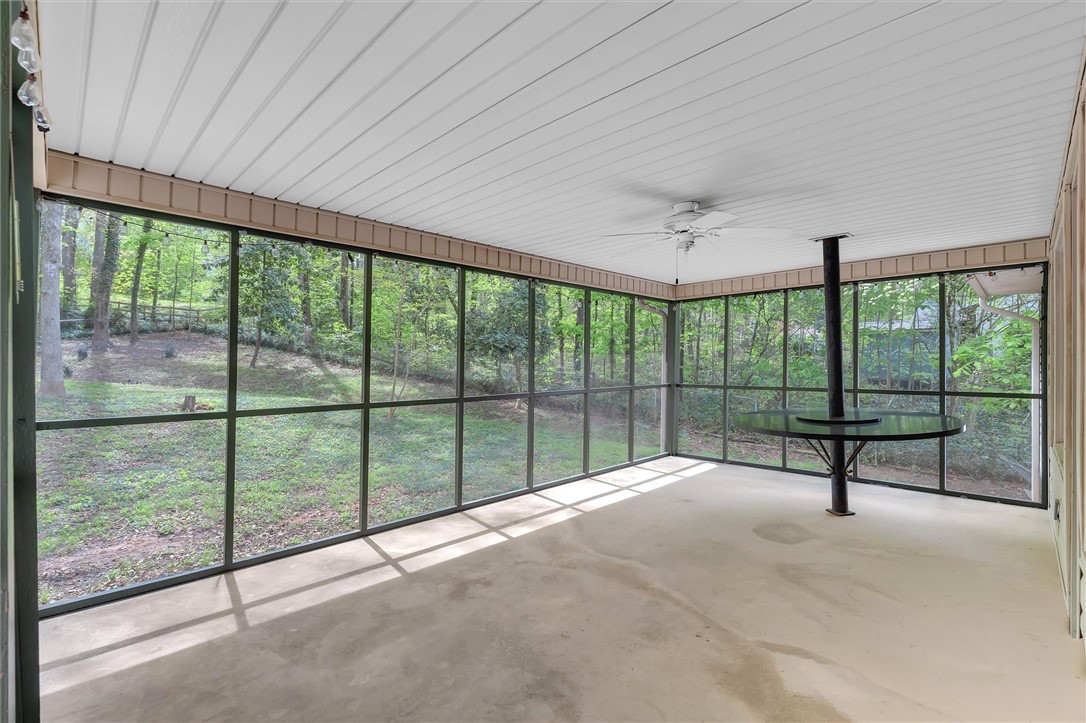 106 Mitchell Avenue Clemson, SC 29631 - Photo 23 of 31 Enjoy nature's embrace from this expansive screened porch.
