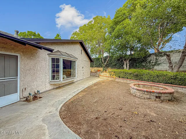 a view of backyard of house