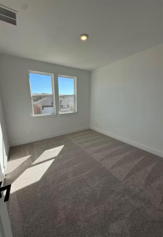151 Sincere Drive Kyle, TX 78640 - Photo 12 of 15 a view of an empty room with a window