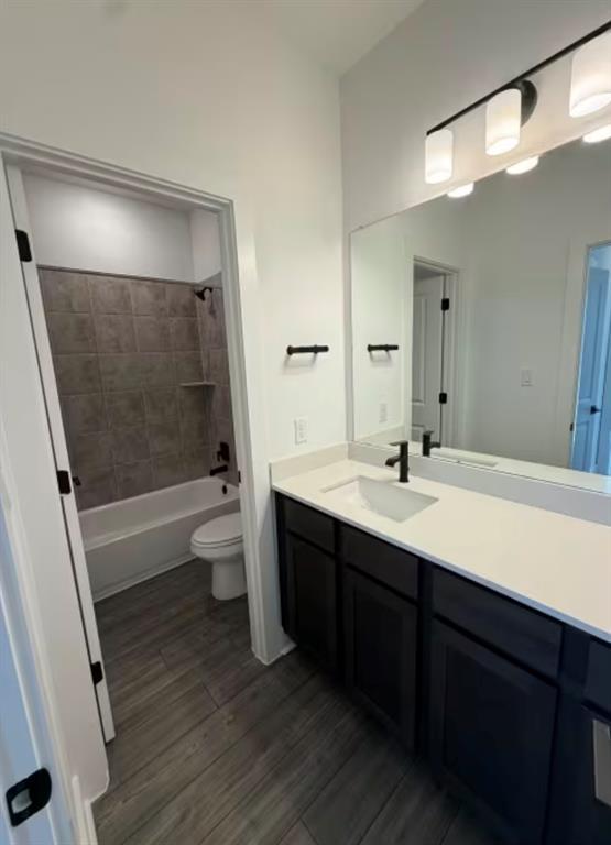 151 Sincere Drive Kyle, TX 78640 - Photo 13 of 15 a bathroom with a double vanity sink toilet and shower