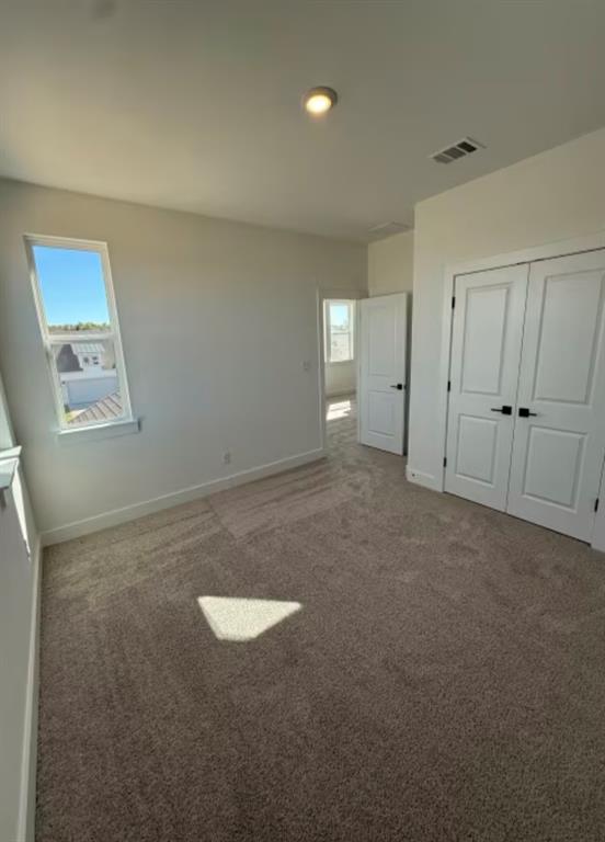 151 Sincere Drive Kyle, TX 78640 - Photo 14 of 15 an empty room with windows