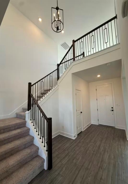 151 Sincere Drive Kyle, TX 78640 - Photo 4 of 15 a view of staircase with railing and white walls