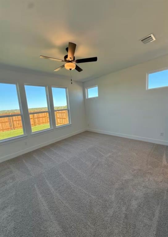 151 Sincere Drive Kyle, TX 78640 - Photo 5 of 15 a view of an empty room with a window