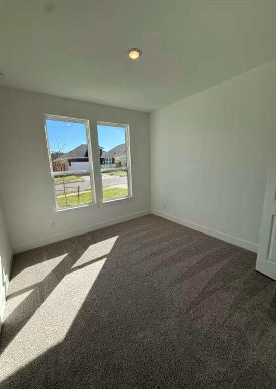 151 Sincere Drive Kyle, TX 78640 - Photo 9 of 15 a view of an empty room with a window