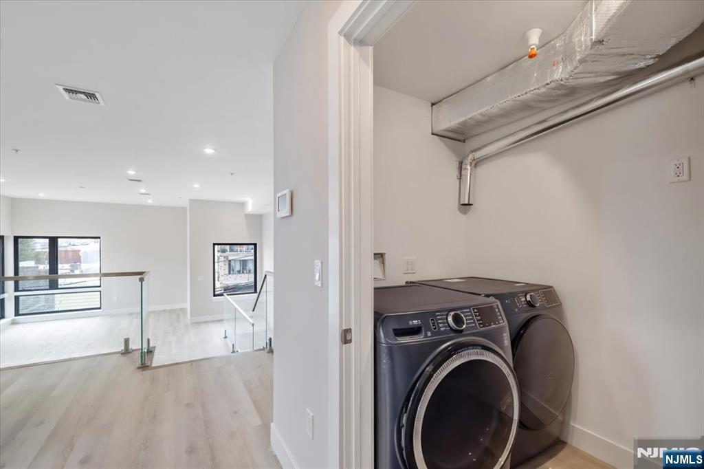 524 64th Street, Unit 2 West New York, NJ 07093 - Photo 5 of 18 a view of a storage & utility room with closet dryer