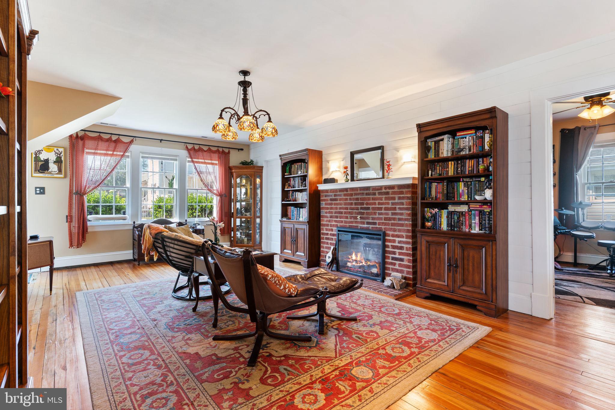 2844 Ridge Road Huntingtown, MD 20639 - Photo 5 of 47 a living room with furniture and a fireplace