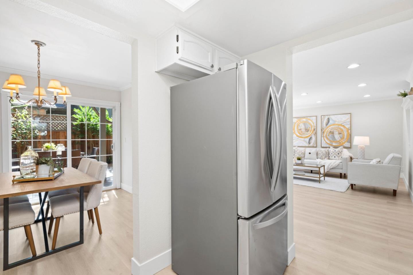 1165 Smith Avenue, Unit B Campbell, CA 95008 - Photo 24 of 46 a kitchen with stainless steel appliances granite countertop a refrigerator and a table