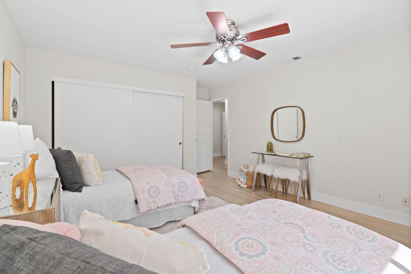 1165 Smith Avenue, Unit B Campbell, CA 95008 - Photo 31 of 46 a bedroom with bed and a chandelier