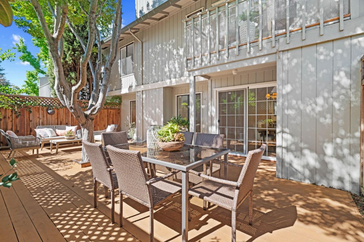 1165 Smith Avenue, Unit B Campbell, CA 95008 - Photo 39 of 46 a view of a patio with table and chairs and potted plants