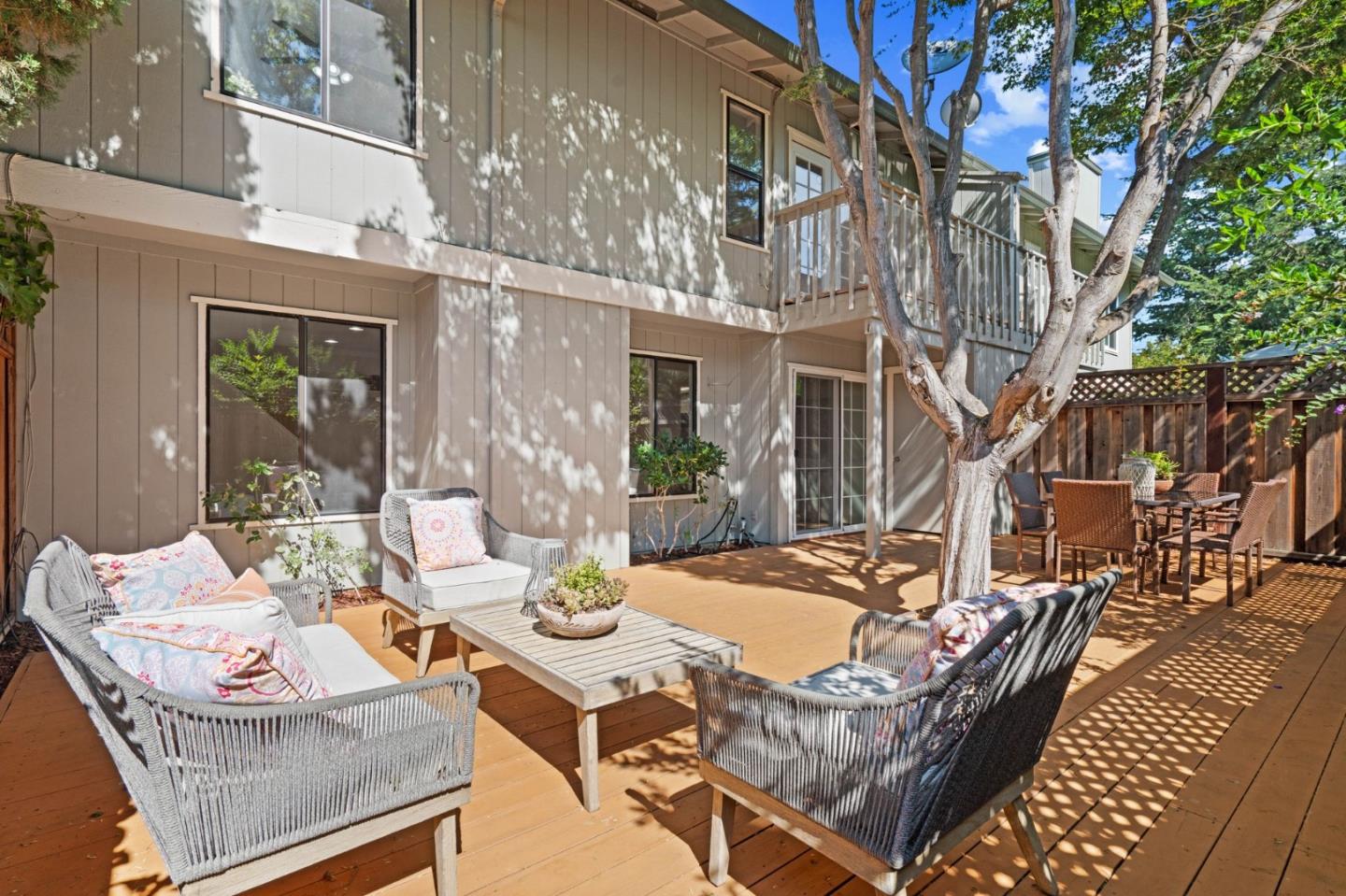 1165 Smith Avenue, Unit B Campbell, CA 95008 - Photo 41 of 46 a view of a patio with couches table and chairs and potted plants