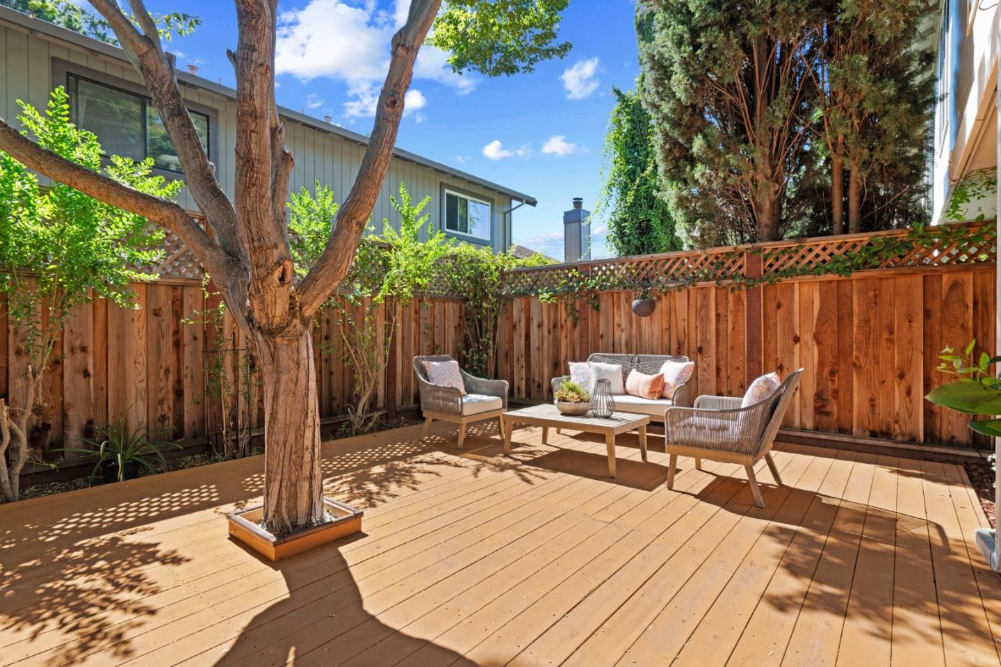 1165 Smith Avenue, Unit B Campbell, CA 95008 - Photo 46 of 46 a view of a patio with a table and chairs