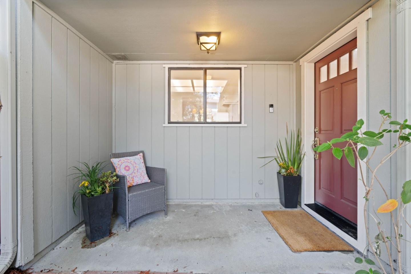 1165 Smith Avenue, Unit B Campbell, CA 95008 - Photo 7 of 46 a room with a door and a potted plant
