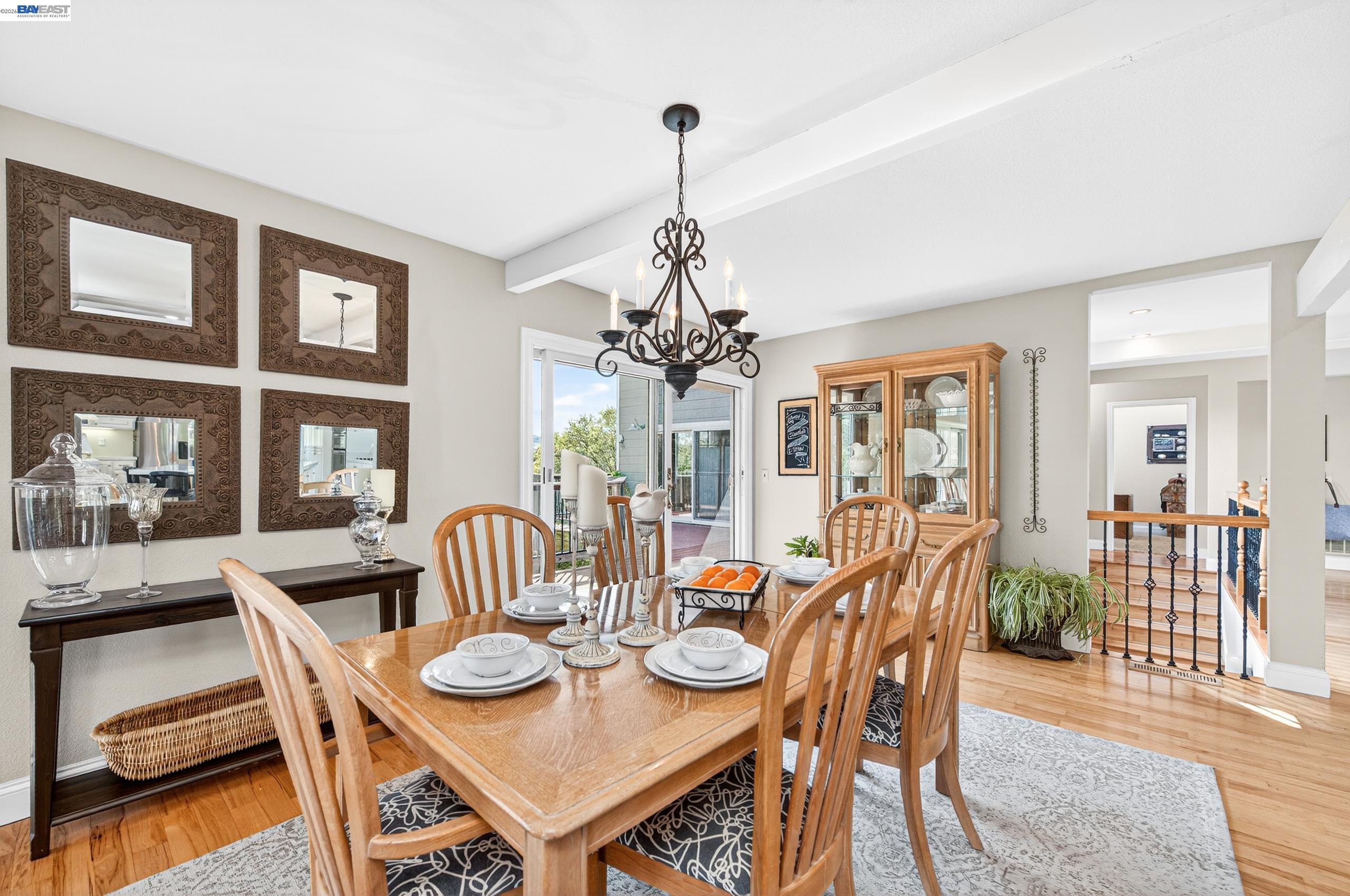10700 Foothill Road Sunol, CA 94586 - Photo 25 of 60 a view of a dining room with furniture wooden floor and chandelier