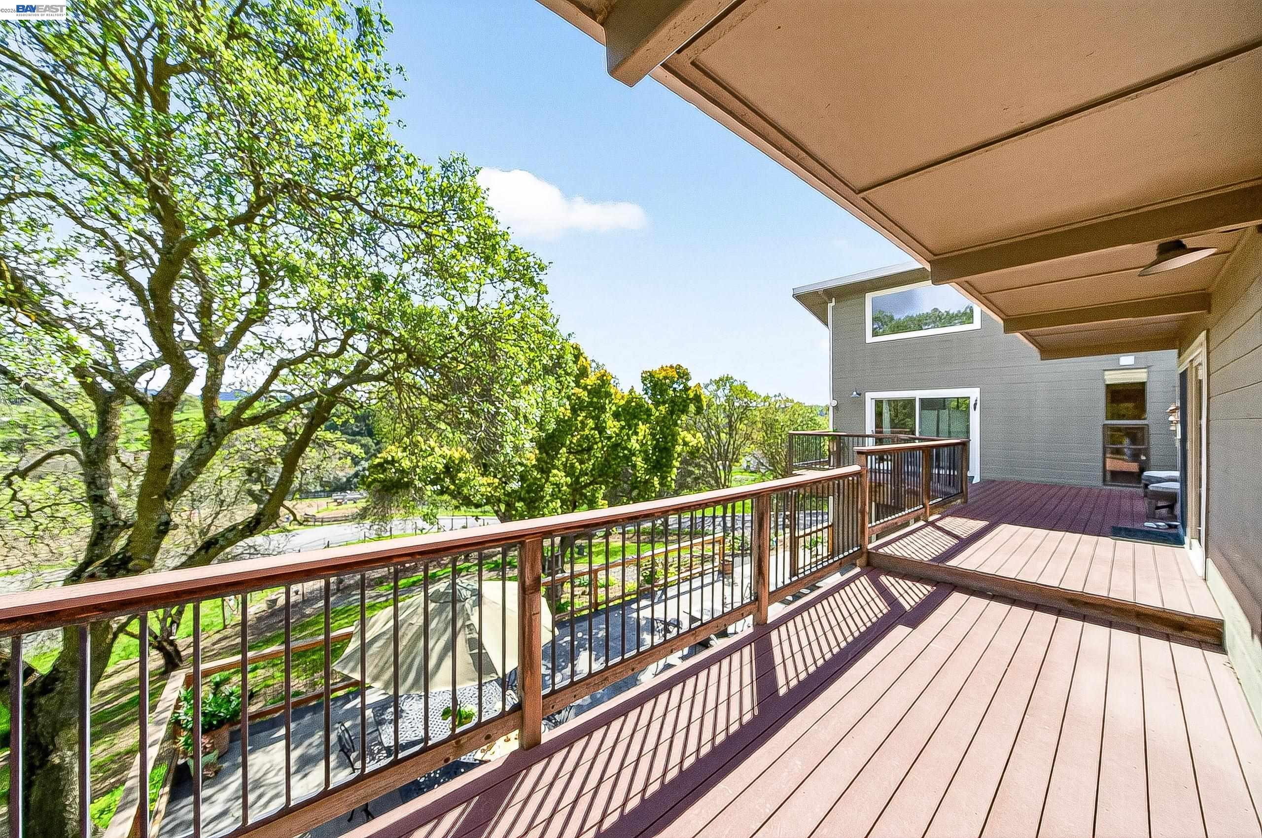 10700 Foothill Road Sunol, CA 94586 - Photo 40 of 60 a view of balcony with wooden floor and fence