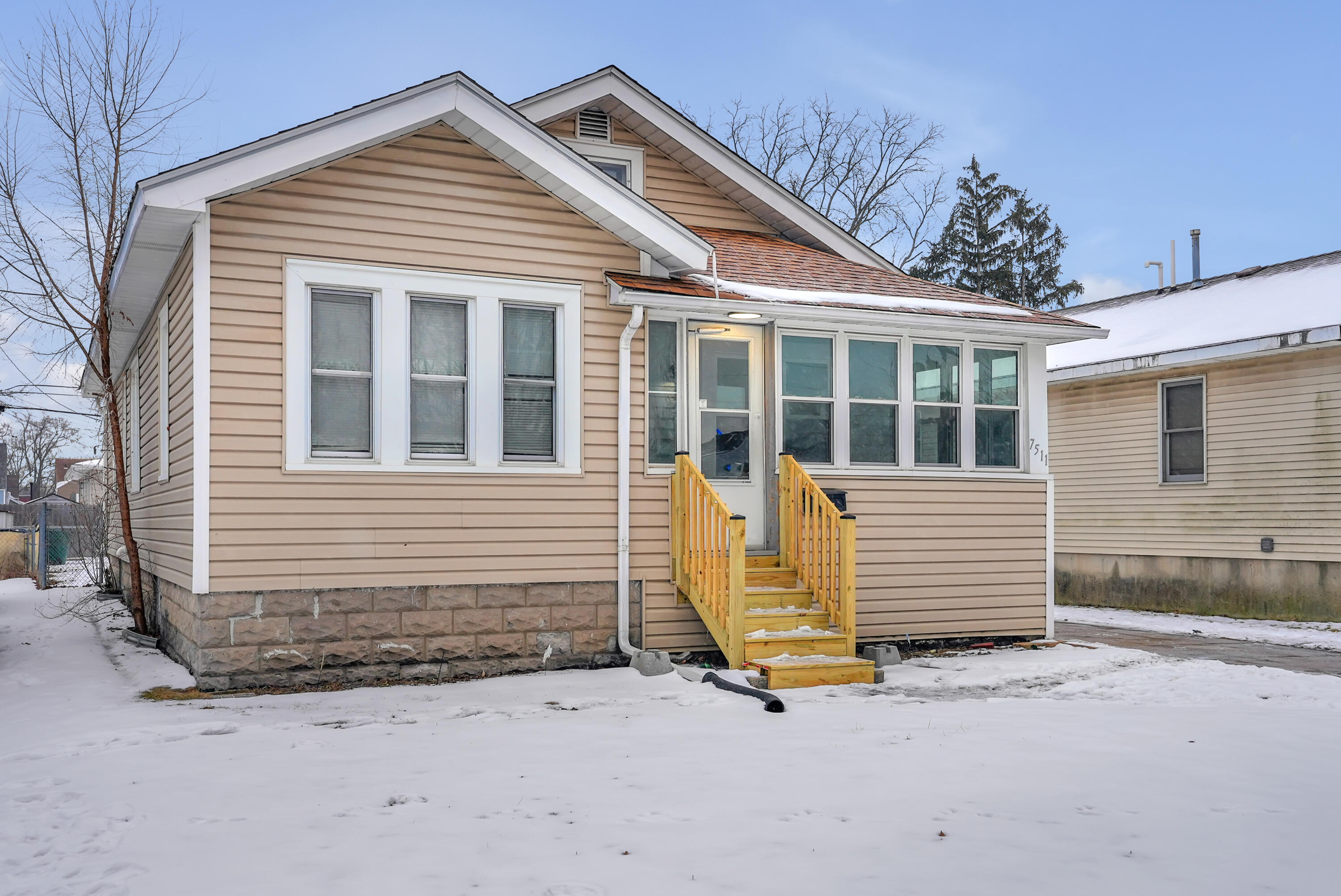 7511 Monroe Avenue Hammond, IN 46324 - Photo 3 of 20 a view of a house with a garage