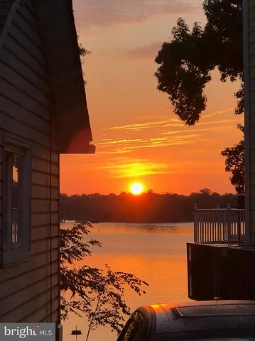 a view of a lake from a balcony