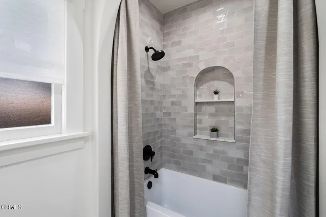 a bathroom with a bathtub