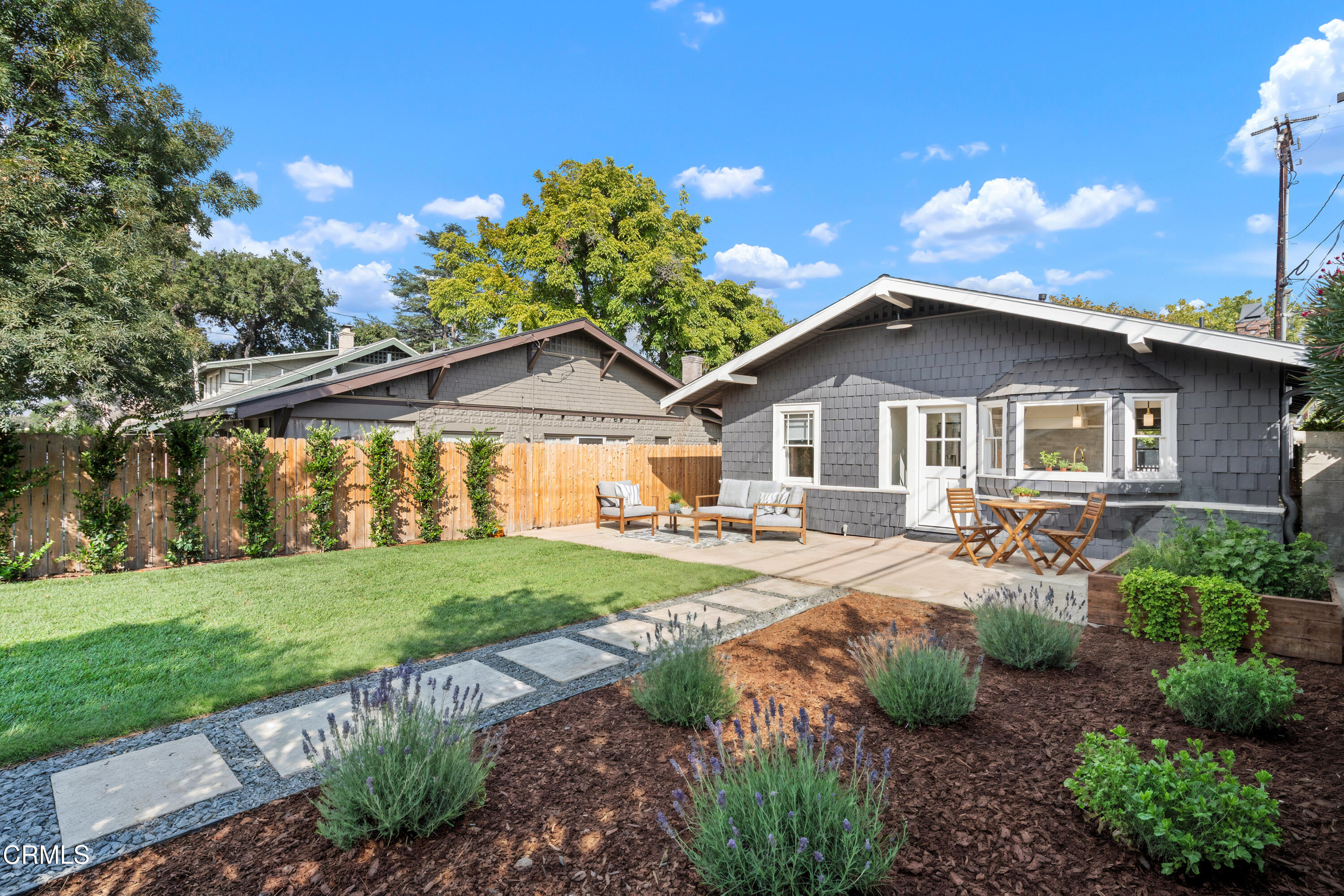 114 West 3rd Street San Dimas, CA 91773 - Photo 17 of 23 a view of a house with a yard