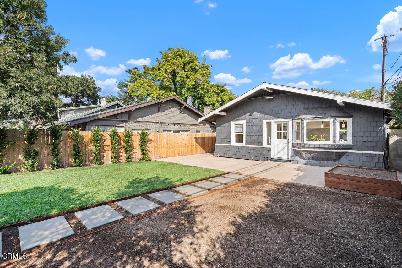 114 West 3rd Street San Dimas, CA 91773 - Photo 22 of 23 a yellow and red house with a yard