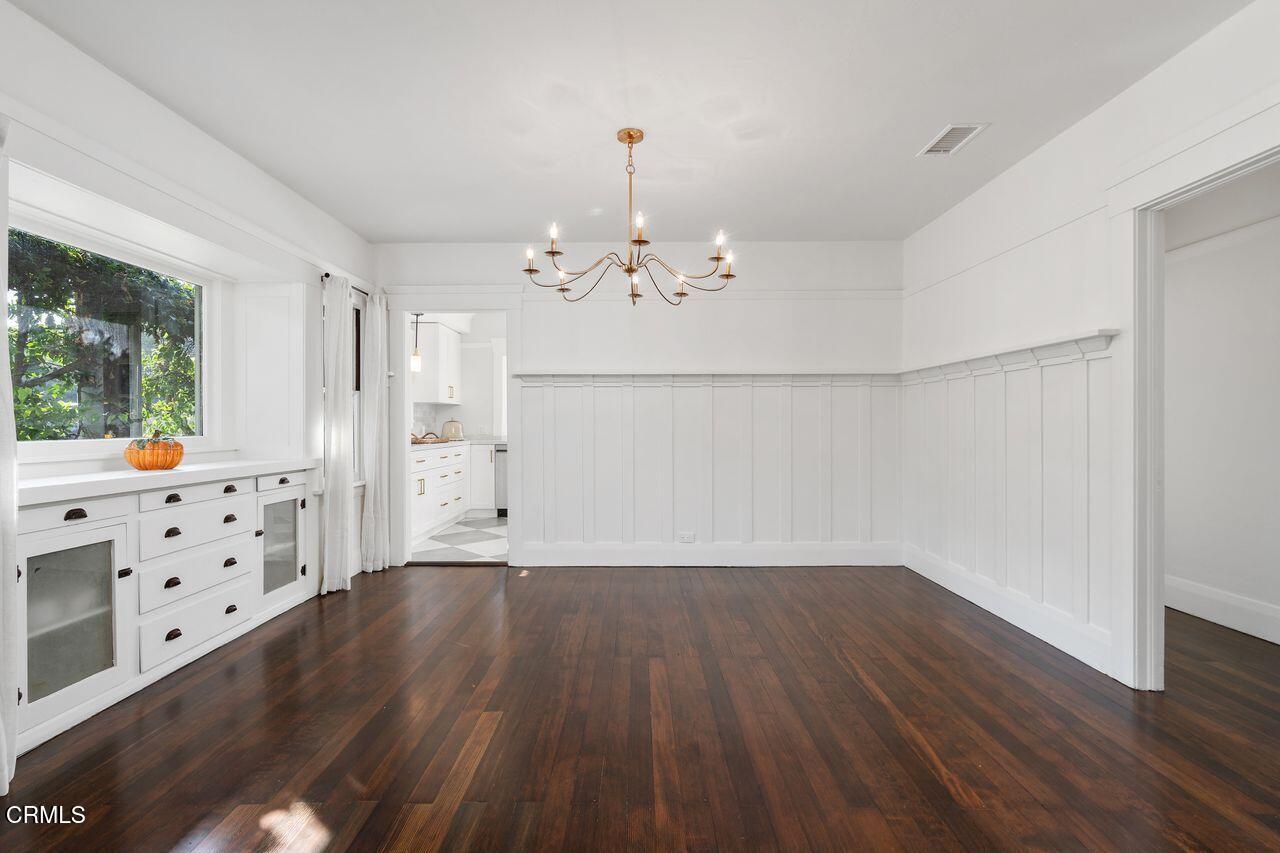 114 West 3rd Street San Dimas, CA 91773 - Photo 7 of 23 wooden floor in an empty room with a window