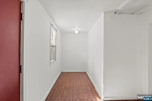 a view of a hallway with entryway