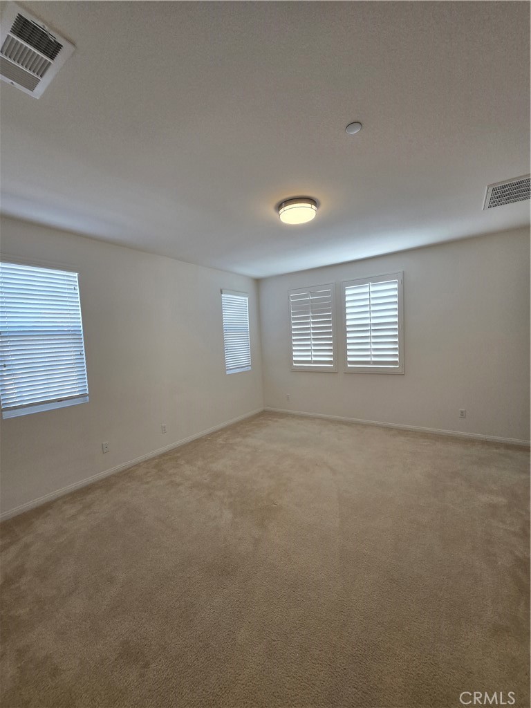 11014 Via Del Corso Riverside, CA 92505 - Photo 18 of 30 a view of an empty room with a window