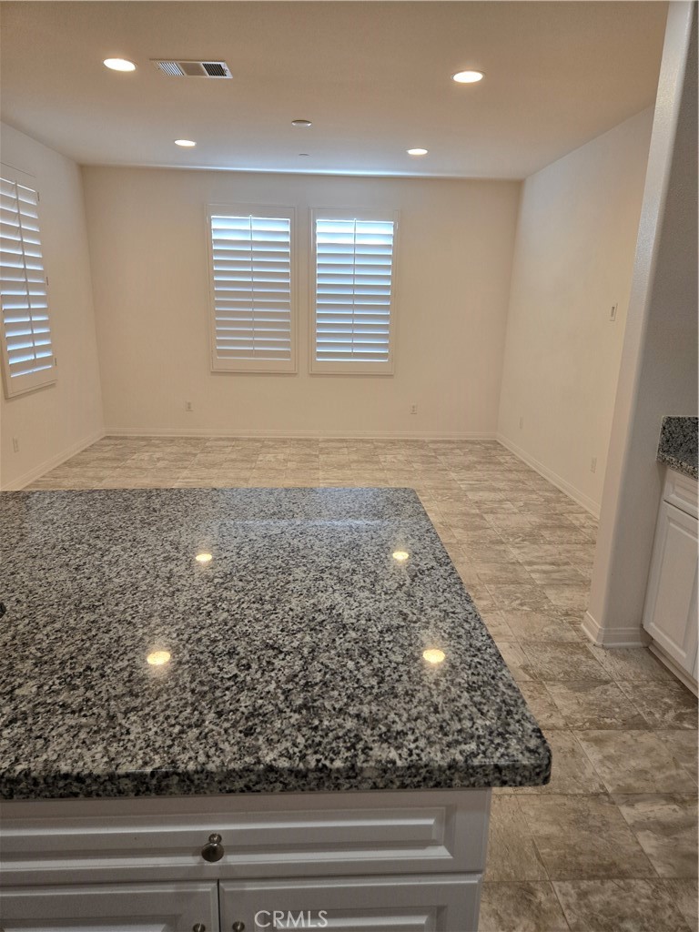 11014 Via Del Corso Riverside, CA 92505 - Photo 6 of 30 an empty room with wooden floor