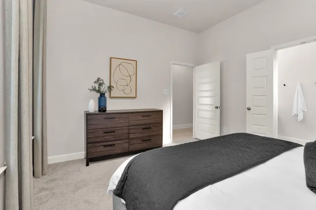 a bathroom with a shower sink and mirror