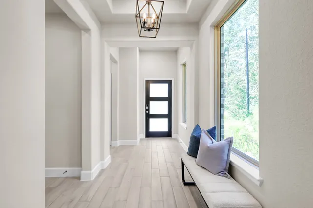 a living room with furniture and window