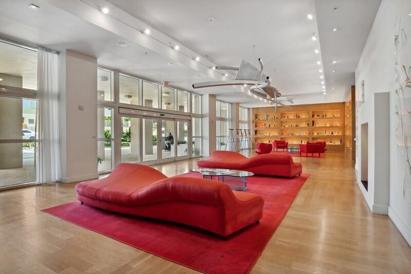 1551 North Flagler Drive, Unit 802 West Palm Beach, FL 33401 - Photo 30 of 31 a bedroom with furniture and a large window