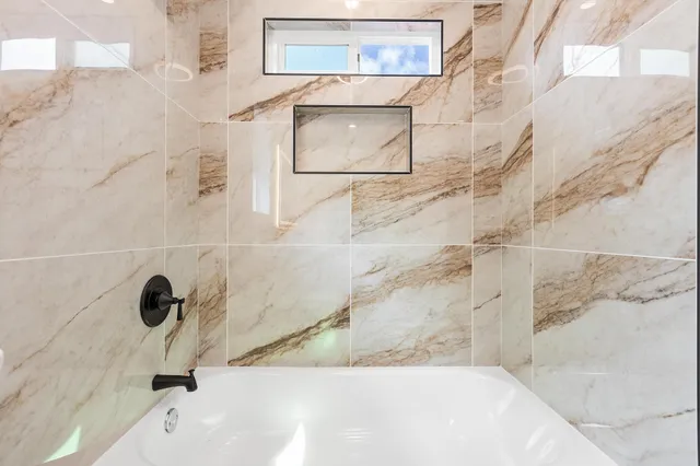 a bathroom with a tub