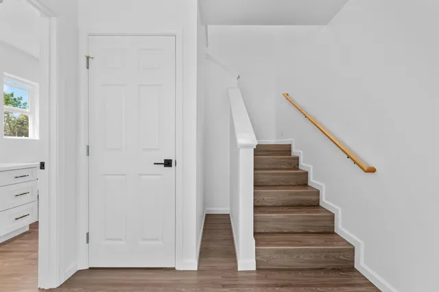 a view of entryway with wooden floor