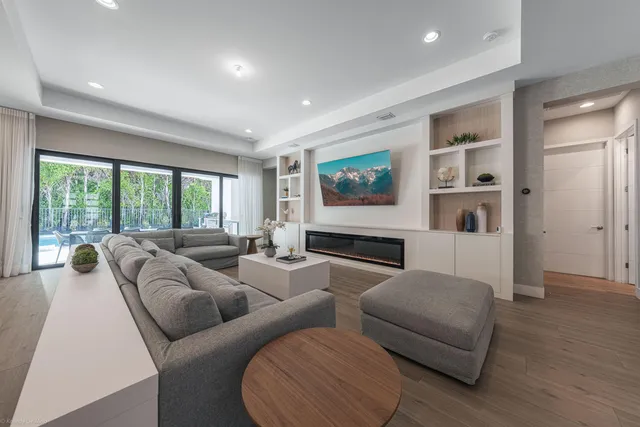 a bed room with a bed and a mirror