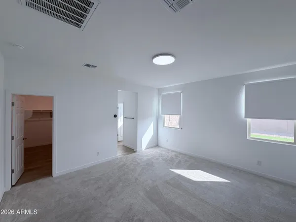 an empty room with windows