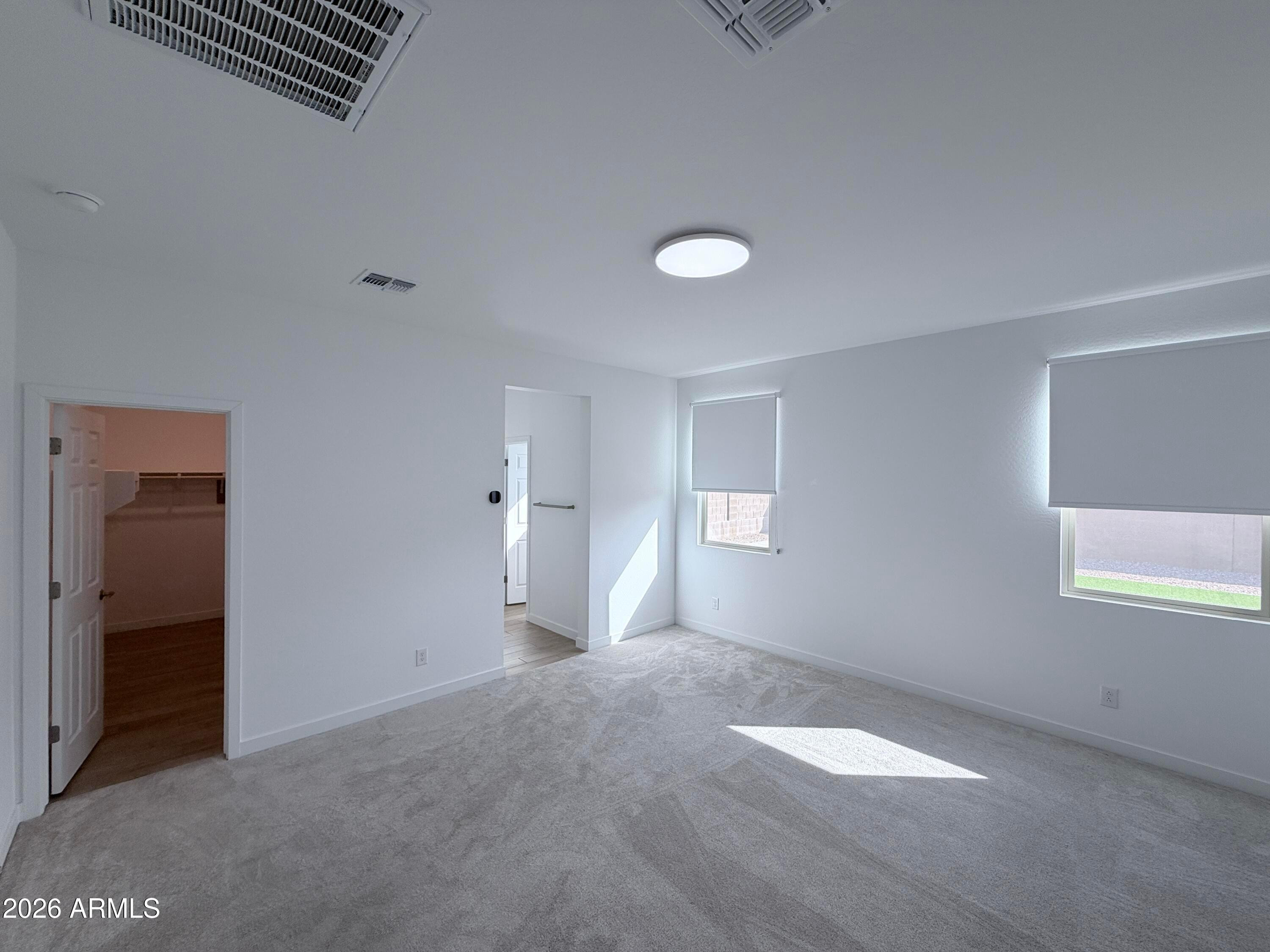 4323 West Palace Sta Road New River, AZ 85087 - Photo 11 of 20 an empty room with windows