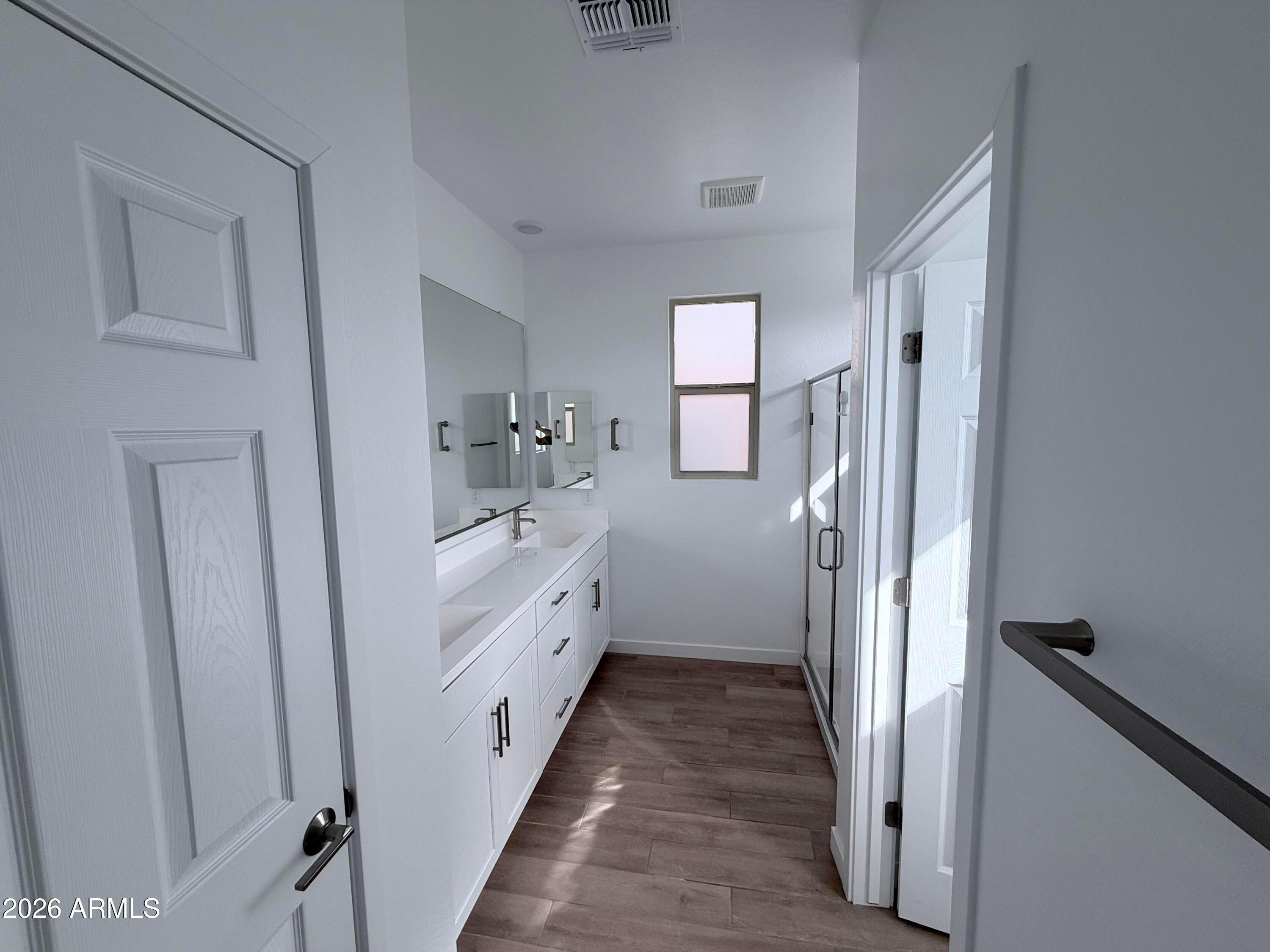 4323 West Palace Sta Road New River, AZ 85087 - Photo 12 of 20 a bathroom with a sink and a mirror