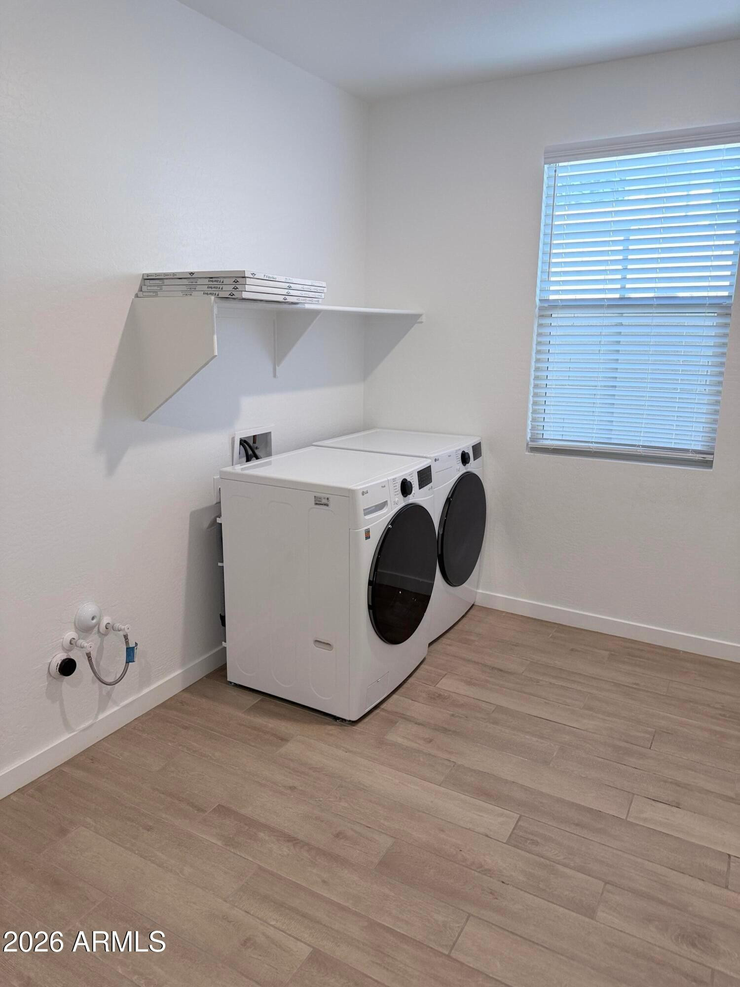 4323 West Palace Sta Road New River, AZ 85087 - Photo 18 of 20 a utility room with washer and dryer