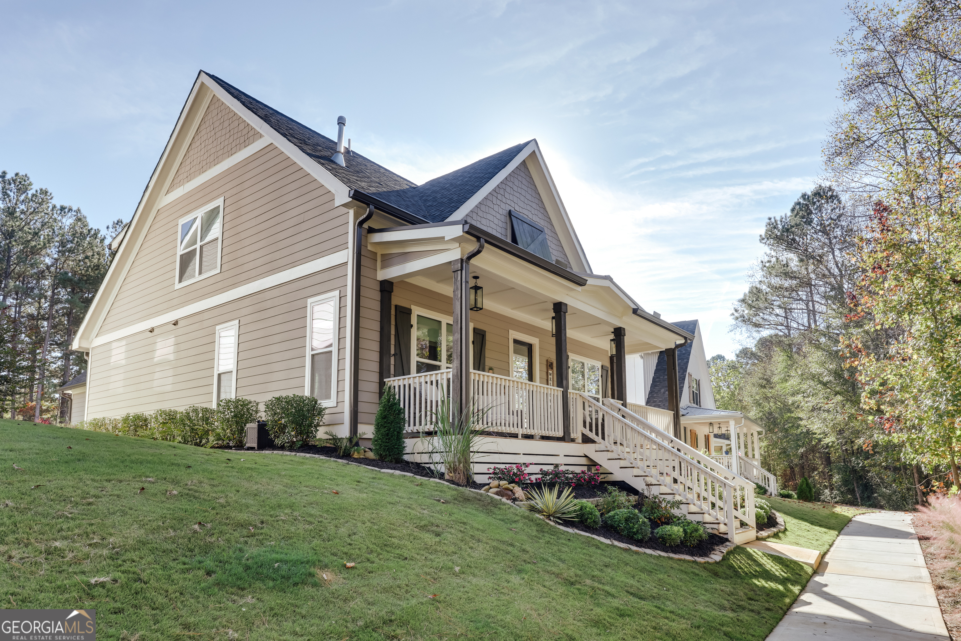 a front view of a house with a yard